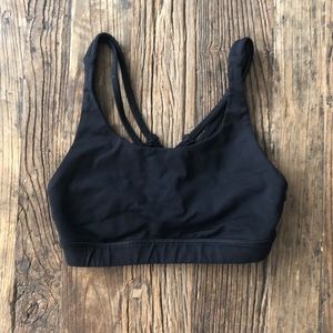 Lululemon black sports bra with crisscross back detail size 4